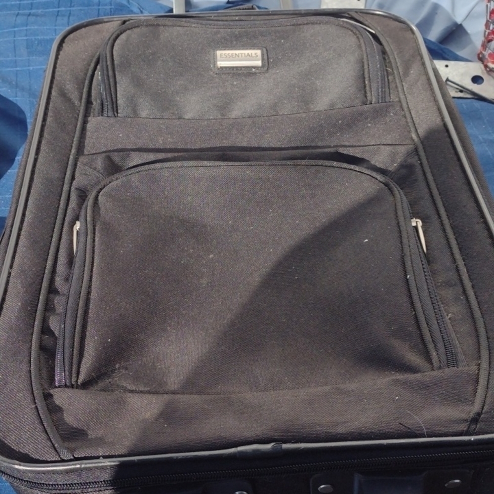 Essentials Travel Suitcase with handles and wheels